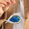 Sleeping Angel Acrylic Keychain Blue and Gold Macaw SA204